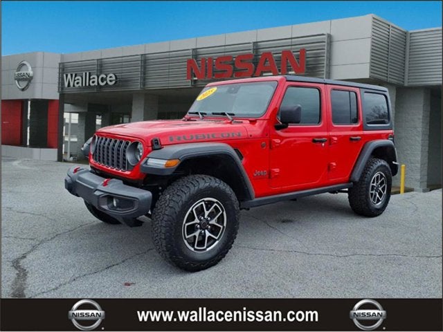 2025 Jeep Wrangler Rubicon in Firecracker Red Clearcoat — front three-quarter view