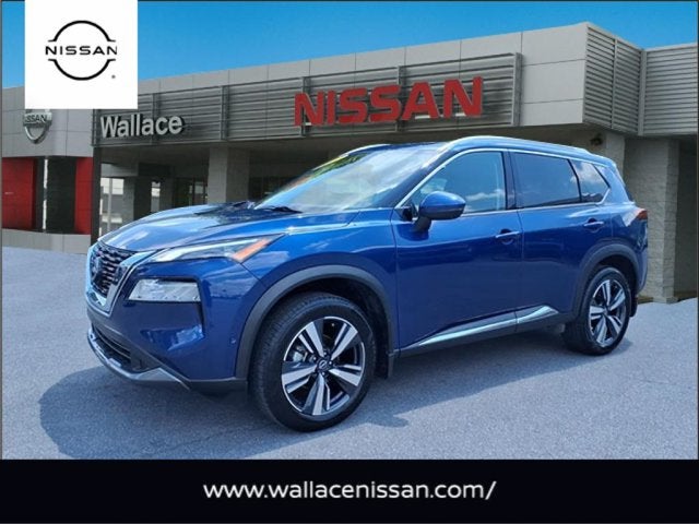 2023 Nissan Rogue SL in Caspian Blue Metallic Rby — front three-quarter view