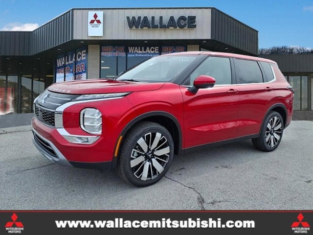 2026 Mitsubishi Outlander SE in Red Diamond P62 — front three-quarter view