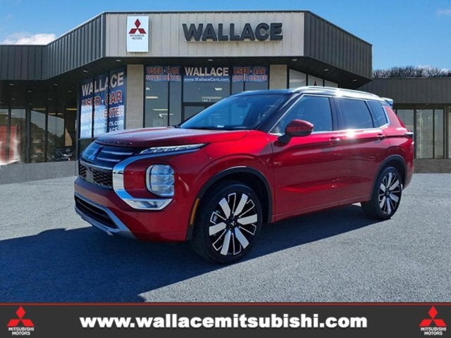 2026 Mitsubishi Outlander SEL in Red Diamond Black Roof — front three-quarter view