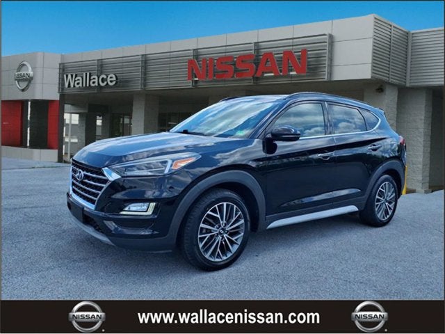 2020 Hyundai TUCSON Ultimate in Black Noir Pearl Nka — front three-quarter view